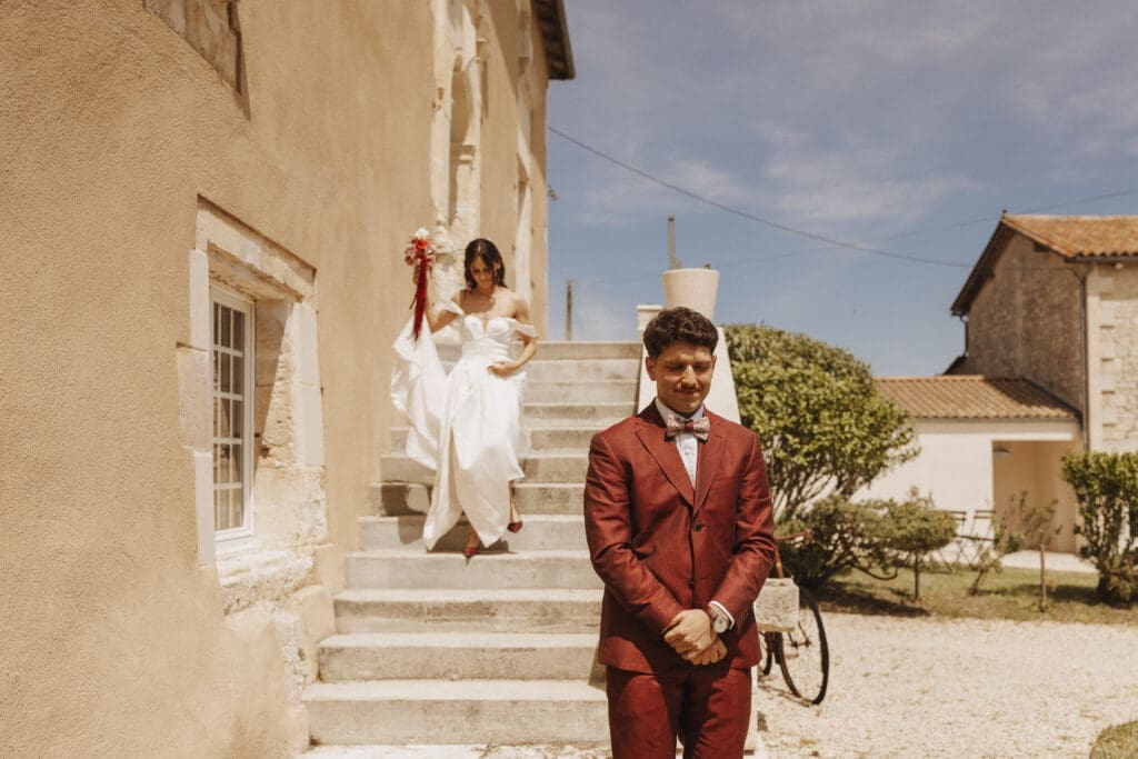 First look mariage au Logis des Calices Jurignac — premier regard des mariés, photographe mariage Charente